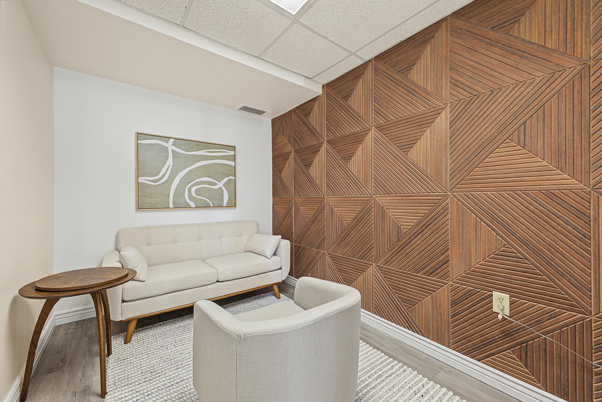 Private therapy suite interior — warm furnishings, natural light
